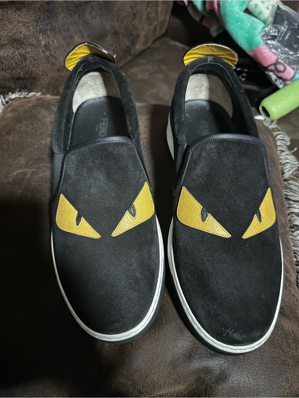 Fendi Men’s Black Suede Slip-On Sneakers with Yellow Eye Detail